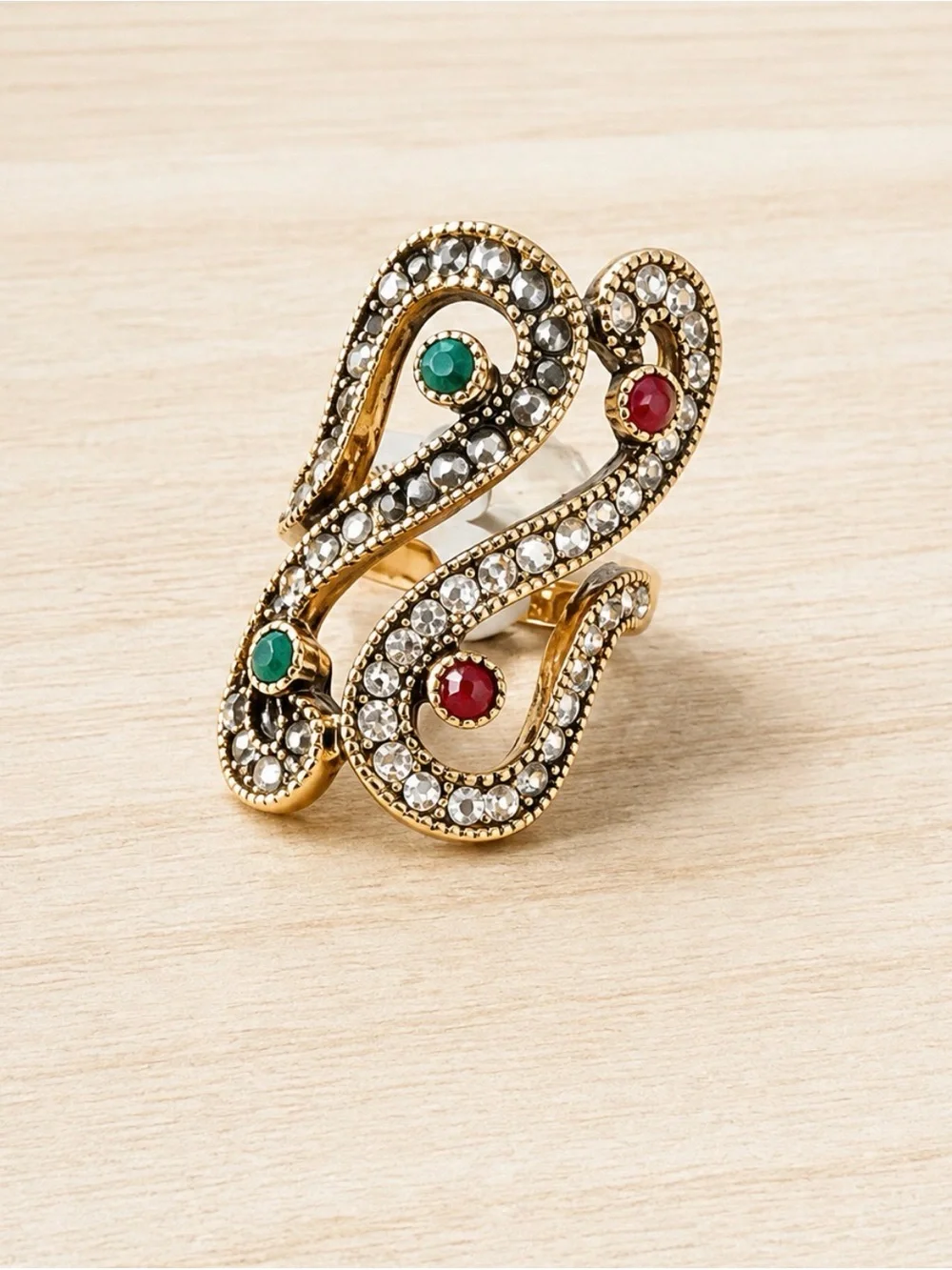 Gold Vintage-Inspired Crystal Swirl Ring with Red and Green Accents